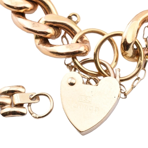 134 - A gold chain link bracelet with a hallmarked 9ct gold heart padlock clasp together and a 9ct gold na... 