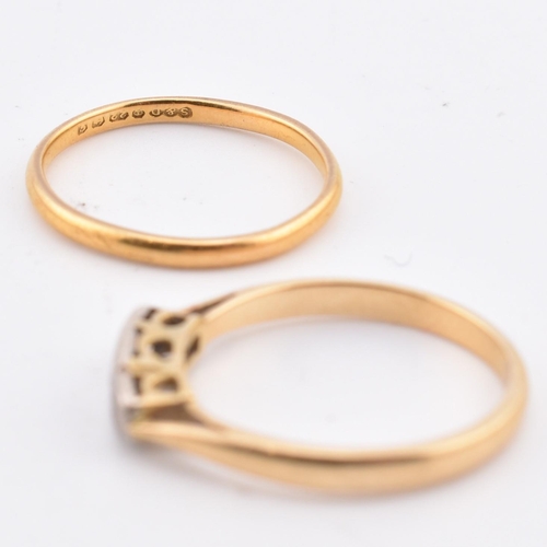 141 - A hallmarked 22ct gold band ring and an 18ct gold and diamond ring. The lot to include a hallmarked ... 