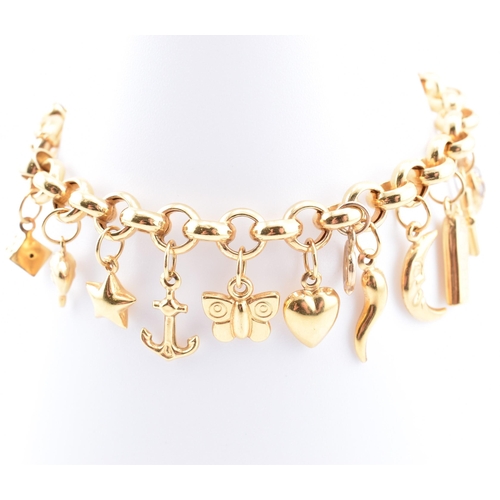 144 - A hallmarked 9ct gold charm bracelet. The 9ct yellow gold charm bracelet comprised of belcher link c... 