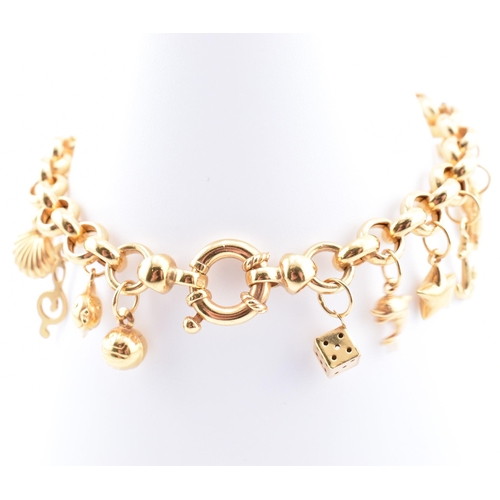 144 - A hallmarked 9ct gold charm bracelet. The 9ct yellow gold charm bracelet comprised of belcher link c... 