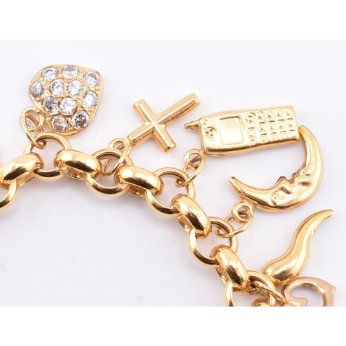 144 - A hallmarked 9ct gold charm bracelet. The 9ct yellow gold charm bracelet comprised of belcher link c... 