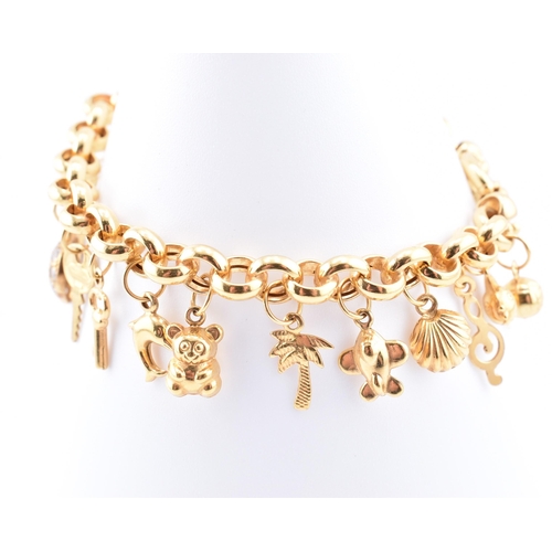 144 - A hallmarked 9ct gold charm bracelet. The 9ct yellow gold charm bracelet comprised of belcher link c... 