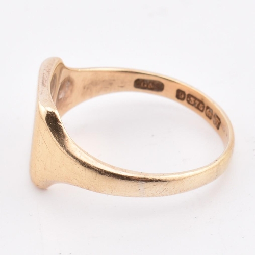 150 - A hallmarked 9ct gold signet ring. The yellow gold signet ring having a squared head with inscribed ... 