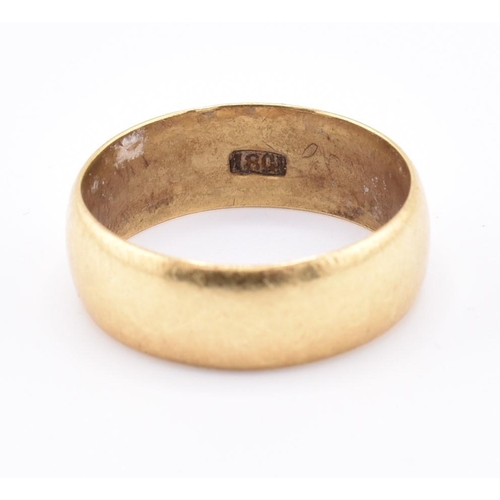 159 - An 18ct gold band ring. Inner shank marked 18ct. Gross weight 6.36g. Size Q. All weights, measuremen... 