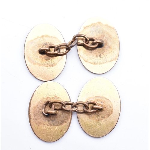 163 - Three pairs of cufflinks. The lot to include a pair of hallmarked 9ct yellow gold knot design cuffli... 