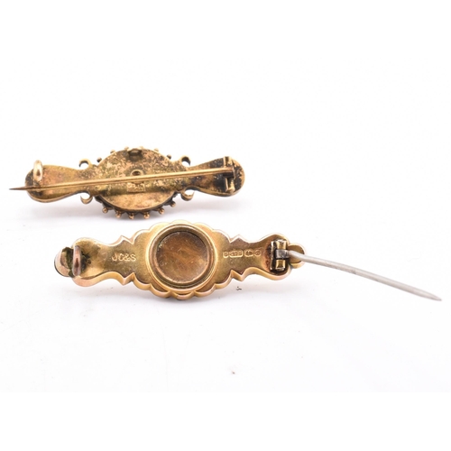 164 - Two gold and gem set brooch pins including 15ct gold. The lot to include a hallmarked 9ct gold and d... 