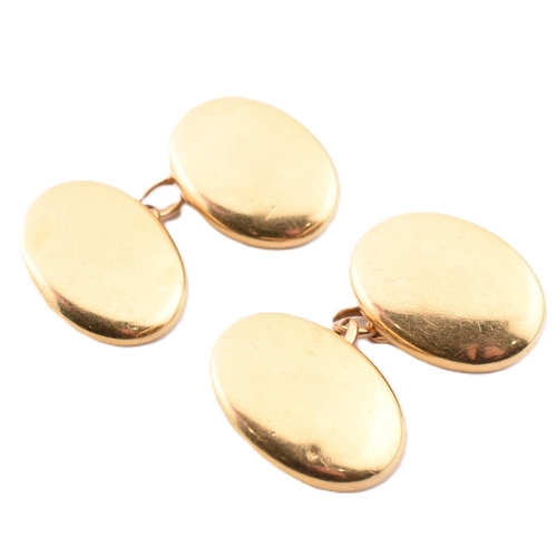 170 - A pair of 18ct gold cufflinks. The 18ct yellow gold chain link cufflinks having polished oval heads.... 