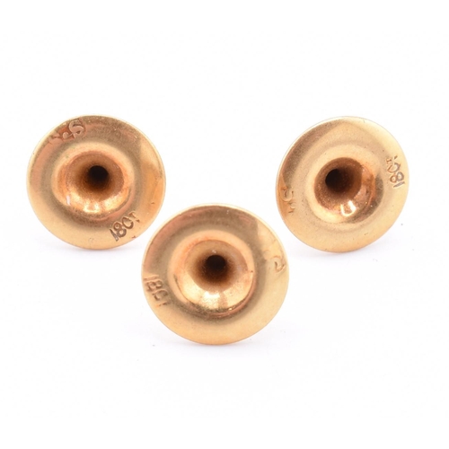 175 - Three 18ct gold button studs. All stamped 18ct. Total weight 2.23g