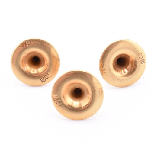 175 - Three 18ct gold button studs. All stamped 18ct. Total weight 2.23g