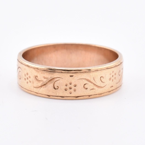 182 - Edwardian hallmarked 9ct gold band ring. The ring with foliate decoration to band. Hallmarked London... 