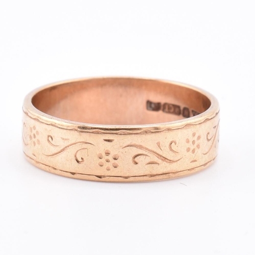 182 - Edwardian hallmarked 9ct gold band ring. The ring with foliate decoration to band. Hallmarked London... 