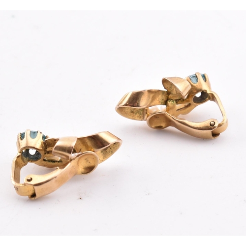 188 - A pair of 9ct gold, zircon and pearl earrings. The 9ct yellow gold clip earrings having a claw set r... 