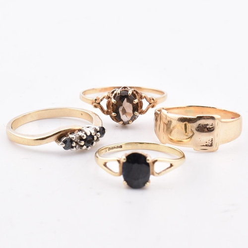 204 - Four hallmarked 9ct gold rings. The four rings to include a hallmarked 9ct gold sapphire and diamond... 