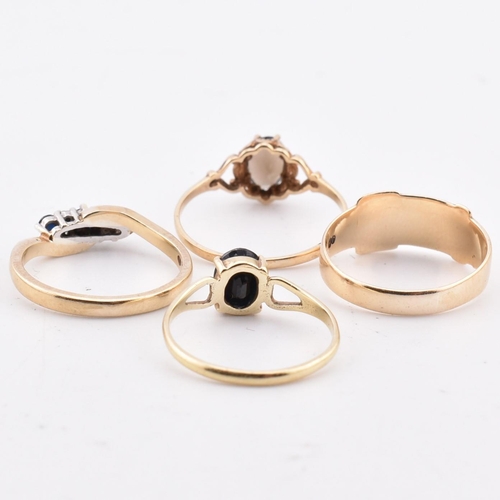 204 - Four hallmarked 9ct gold rings. The four rings to include a hallmarked 9ct gold sapphire and diamond... 