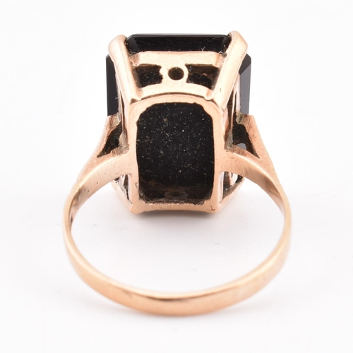 209 - A 9ct gold and onyx Roman soldier intaglio ring. The 9ct yellow gold ring set with onyx carved with ... 