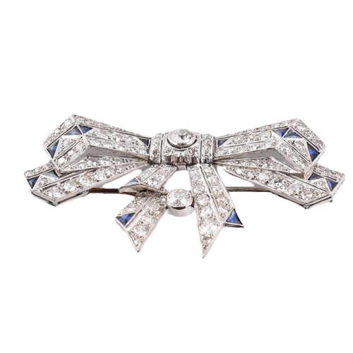 21 - An Art Deco ribbon bow sapphire and diamond brooch pin. The brooch set 104 old and eight cut diamond... 