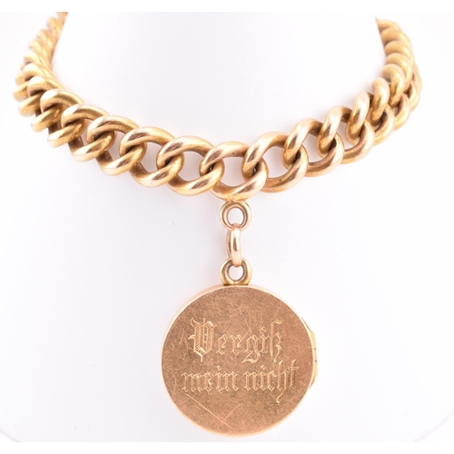 25 - An early 20th-century 18ct gold bracelet and engraved locket. The 18ct yellow gold curb link chain h... 