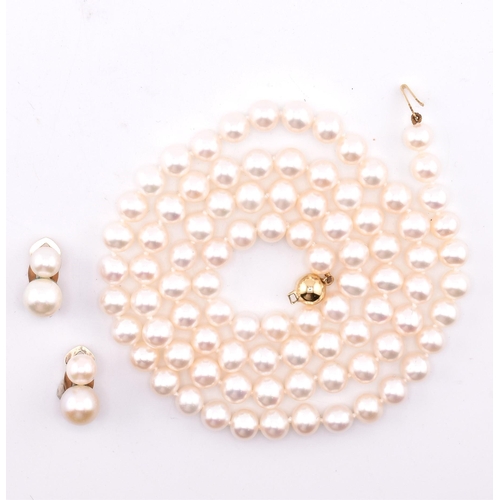 269 - A cultured pearl necklace and earrings. The single strand necklace strung with cultured pearls to a ... 