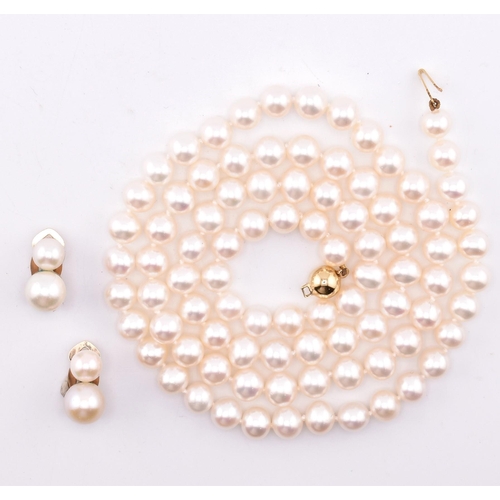 269 - A cultured pearl necklace and earrings. The single strand necklace strung with cultured pearls to a ... 