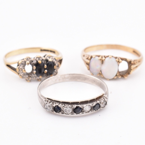 277 - Two hallmarked 9ct gold and gem set rings AF and a 9ct gold on silver ring. The lot to include a hal... 