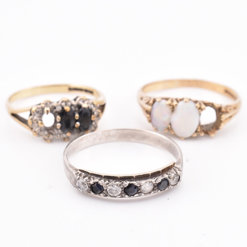 277 - Two hallmarked 9ct gold and gem set rings AF and a 9ct gold on silver ring. The lot to include a hal... 