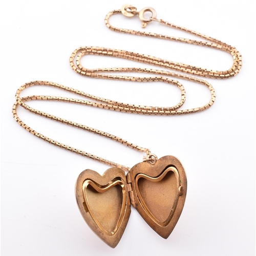 279 - A 10ct gold heart locket pendant on an 18ct gold chain necklace. The 10ct gold heart locket pendant ... 