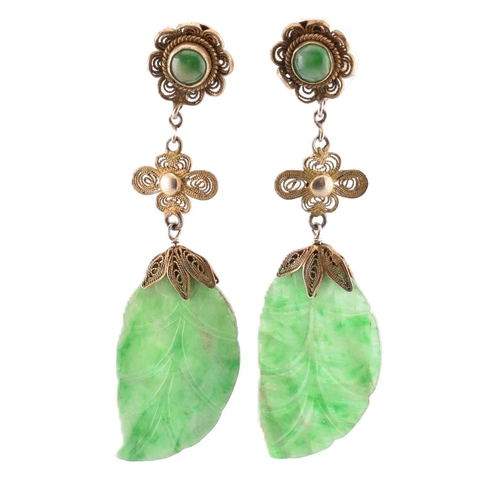 280 - A pair of silver and jade pendant earrings. The earrings having a jade pendant in the form of a leaf... 