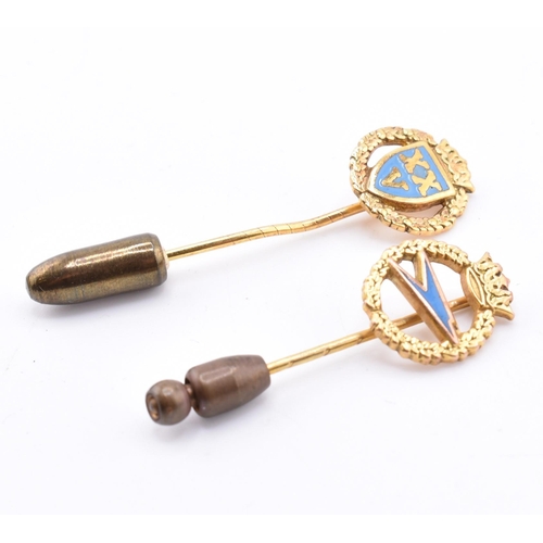 319 - Two hallmarked 9ct gold BOAC stick pins. The lot to include a hallmarked 9ct gold and blue enamel Br... 