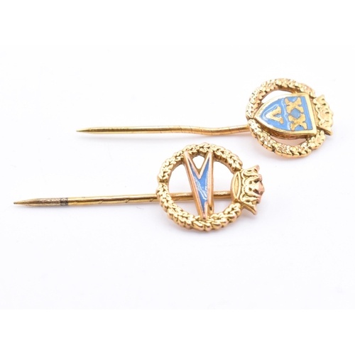 319 - Two hallmarked 9ct gold BOAC stick pins. The lot to include a hallmarked 9ct gold and blue enamel Br... 