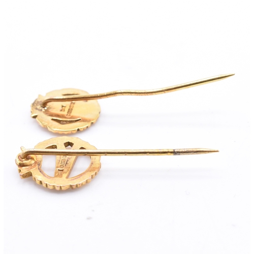 319 - Two hallmarked 9ct gold BOAC stick pins. The lot to include a hallmarked 9ct gold and blue enamel Br... 