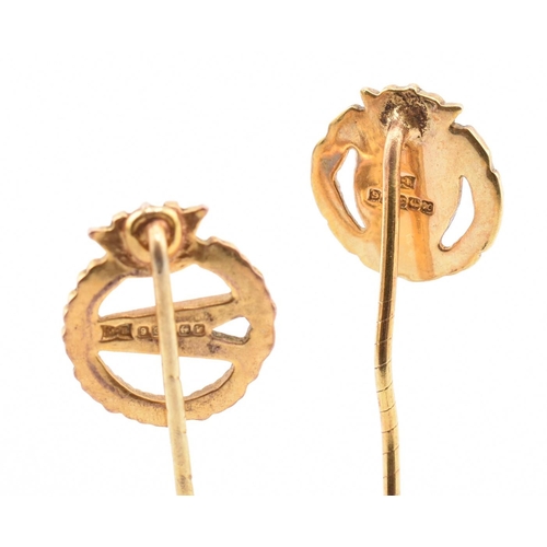 319 - Two hallmarked 9ct gold BOAC stick pins. The lot to include a hallmarked 9ct gold and blue enamel Br... 