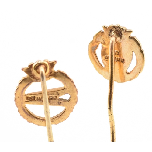 319 - Two hallmarked 9ct gold BOAC stick pins. The lot to include a hallmarked 9ct gold and blue enamel Br... 