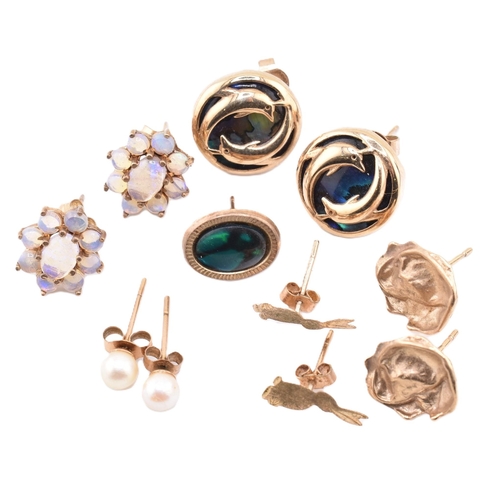 320 - A quantity of 9ct gold and gem set earrings to include abalone, opal, and pearl. The lot sold as fou... 