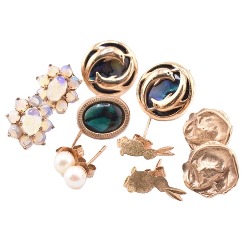 320 - A quantity of 9ct gold and gem set earrings to include abalone, opal, and pearl. The lot sold as fou... 