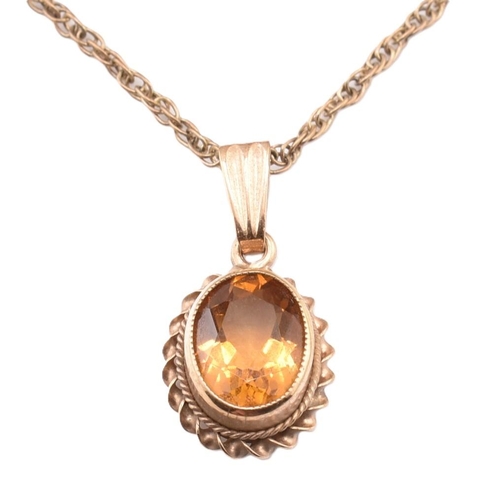 327 - An antique 15ct gold brooch pin and a hallmarked 9ct gold and citrine pendant necklace. The lot to i... 