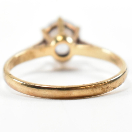 332 - A hallmarked 9ct gold and CZ solitaire ring. The 9ct yellow gold set with a single round cut CZ to p... 