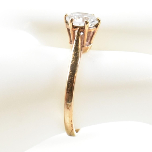 332 - A hallmarked 9ct gold and CZ solitaire ring. The 9ct yellow gold set with a single round cut CZ to p... 