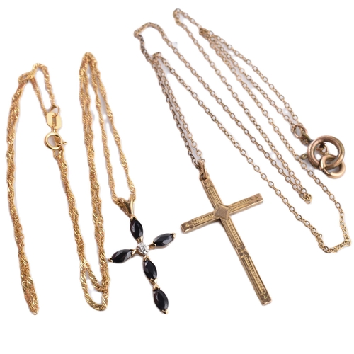 333 - A 9ct gold cross pendant necklace on a rolled gold chain together with a sapphire and diamond cross ... 