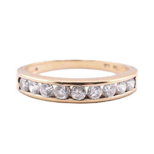 340 - A hallmarked 9ct gold and CZ ring together with a pair of 9ct gold hoop earrings. The lot to include... 