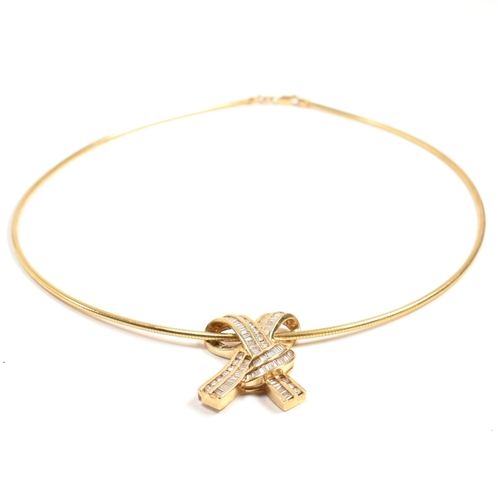 350 - A 14ct gold and diamond ribbon bow pendant necklace. The necklace is strung with a ribbon bow pendan... 