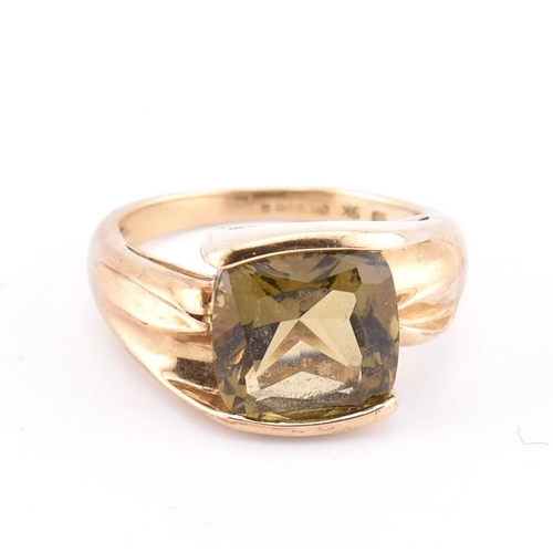 351 - A hallmarked 9ct gold and imperial topaz ring. The ring set with a single half bezel set cushion cut... 