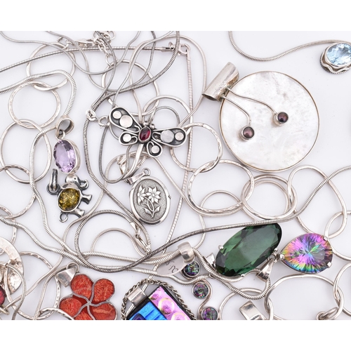 356 - A quantity of 925 silver and white metal pendant necklaces including synthetic opal and cubic zircon... 