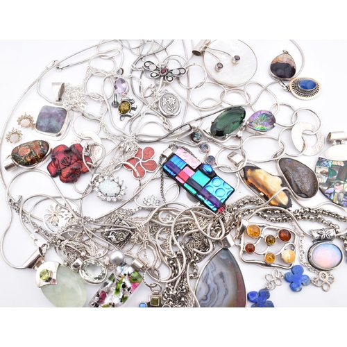 356 - A quantity of 925 silver and white metal pendant necklaces including synthetic opal and cubic zircon... 