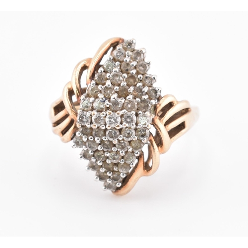 360 - A hallmarked 9ct gold and diamond cluster ring. The 9ct ring having a central cluster of round brill... 