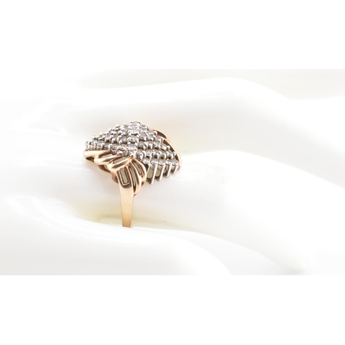 360 - A hallmarked 9ct gold and diamond cluster ring. The 9ct ring having a central cluster of round brill... 