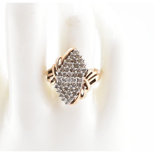 360 - A hallmarked 9ct gold and diamond cluster ring. The 9ct ring having a central cluster of round brill... 