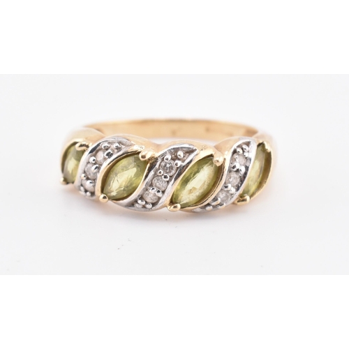 362 - A hallmarked 9ct gold, green sapphire and diamond ring. The 9ct gold ring set with four marquise cut... 