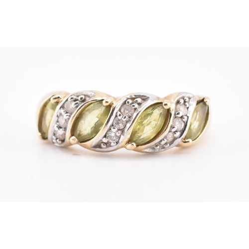 362 - A hallmarked 9ct gold, green sapphire and diamond ring. The 9ct gold ring set with four marquise cut... 