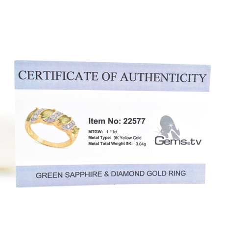 362 - A hallmarked 9ct gold, green sapphire and diamond ring. The 9ct gold ring set with four marquise cut... 