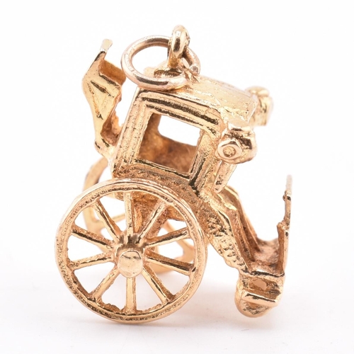 375 - A hallmarked 9ct gold royal carriage charm. Hallmarked for London, 1974. Weight 4.5 g. Measures (inc... 